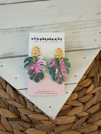 Tropical leaf with pink 
