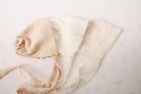 three sitter bonnets 
