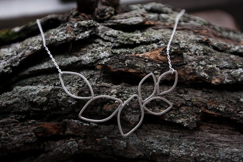 interstellar love craft — 6 leaf lotus necklace