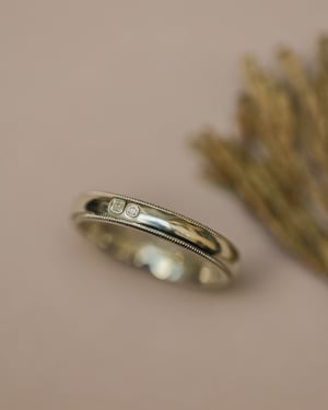Image of 9ct White gold 4mm milled edge ring