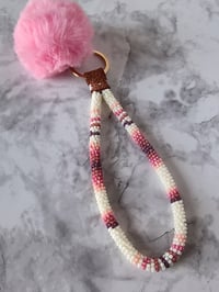 Image 1 of Mini cream & pink wristlet 