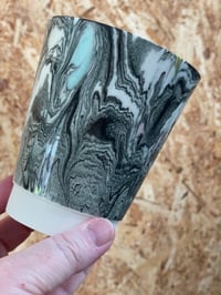 Image 1 of Marbled black with star