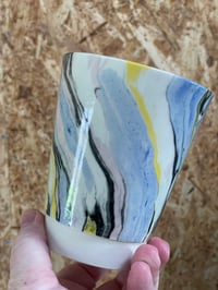 Image 1 of Mabled cup with a yellow twist