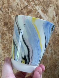 Image 2 of Mabled cup with a yellow twist