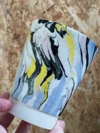 Image 3 of Mabled cup with a yellow twist