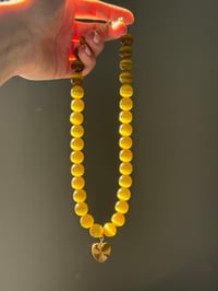 Image 1 of Cat's Eye Glass and Charm
