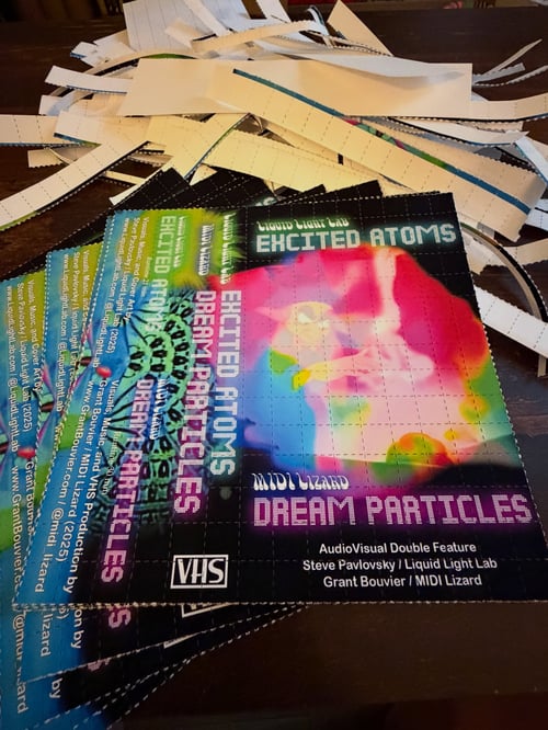 Image of Excited Atoms / Dream Particles RED VHS Tape