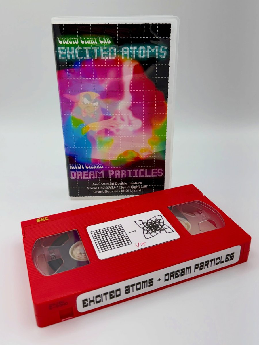 Image of Excited Atoms / Dream Particles RED VHS Tape