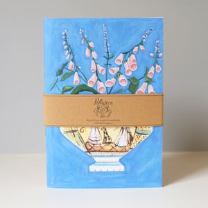 Image of Pair of A5 stapled paper notebooks - blue and pink