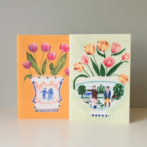 Image of Pair of A5 stapled paper notebooks - orange and green