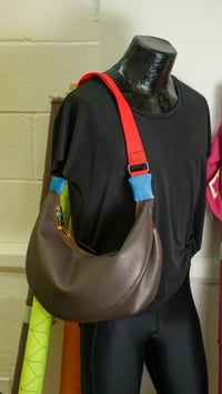 Image 1 of Crescent Handbag in Brown Vinyl with Red Strap