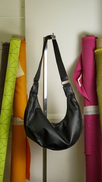 Image 1 of Crescent Handbag in Black Faux Leather