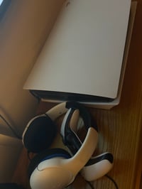 Ps5 with headphones and controller