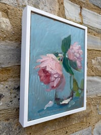 Image 3 of Two pink roses in glass on turquoise 20cm x 26cm 