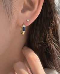 Image 5 of Crescent Blue Sapphire Huggie 