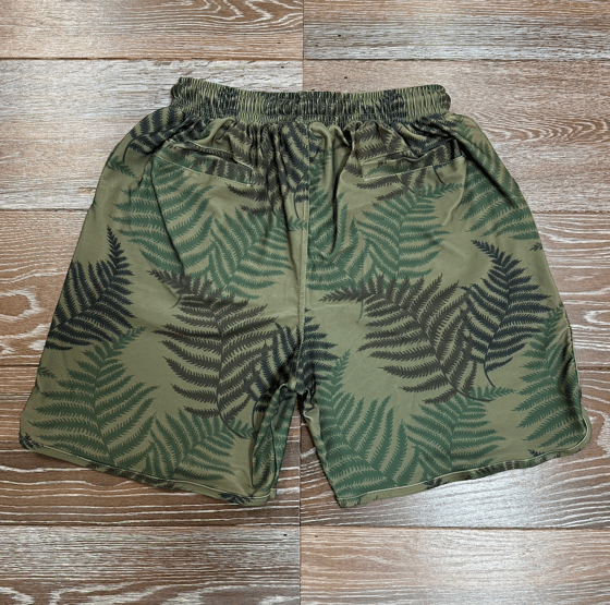 Image of LĀ’AU MEN'S DRI FIT SHORTS GRN