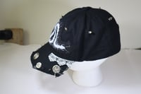 Image 3 of Casket cap with a centipede patch