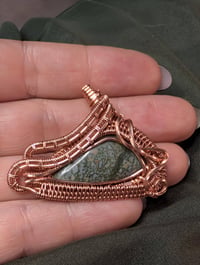 Image 1 of UV Reactive Dinosaur Gembone Pendant 