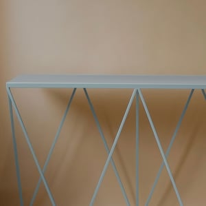 Image of Giraffe console table with natural linoleum top