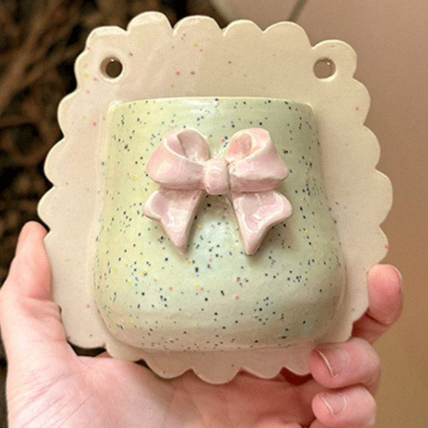 image of bow wall vase