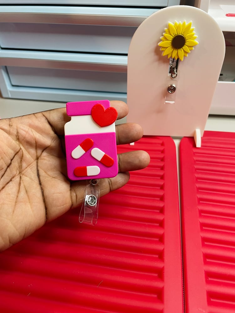 Image of Pill bottle reel badge holder