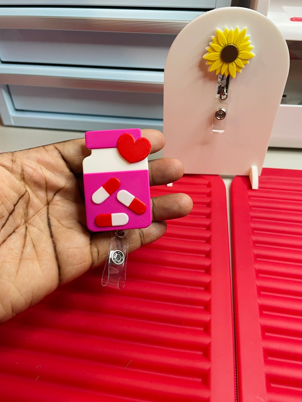 Image of Pill bottle reel badge holder