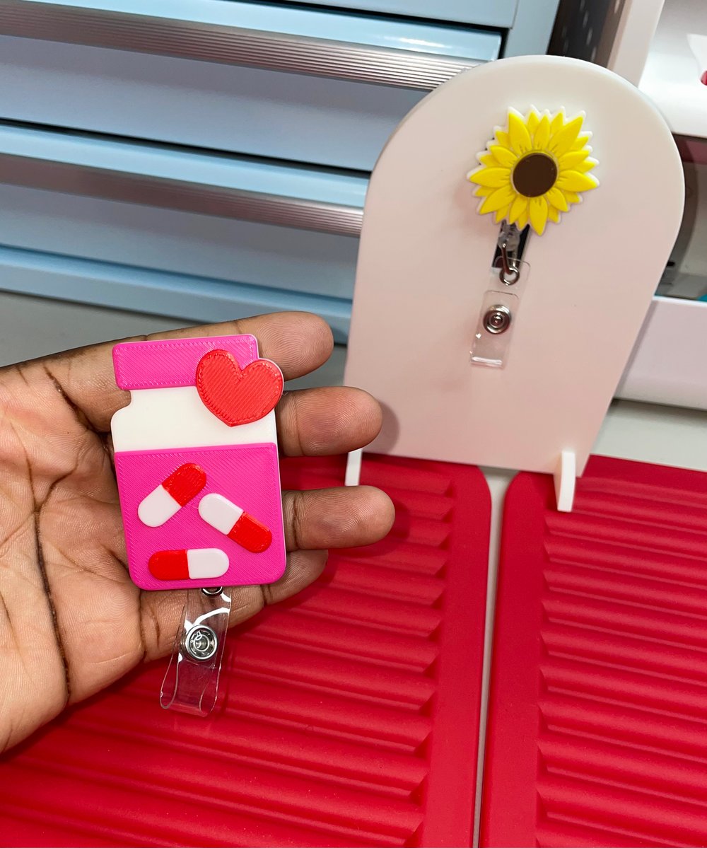 Image of Pill bottle reel badge holder