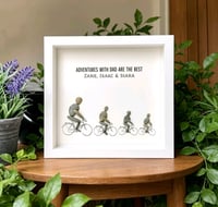 Image 2 of Dad &  3 children on bikes 