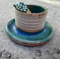 match striker in turquoise