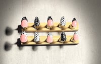 Image 1 of SHORT ALMOND BLACK & WHITE POLKA DOT FRENCH ACRYLIC NAILS