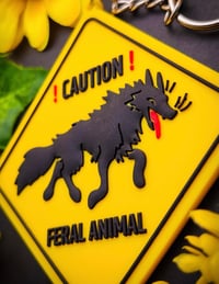 Image 3 of CAUTION FERAL ANIMAL Double-Sided 3D PVC Rubber Keychain