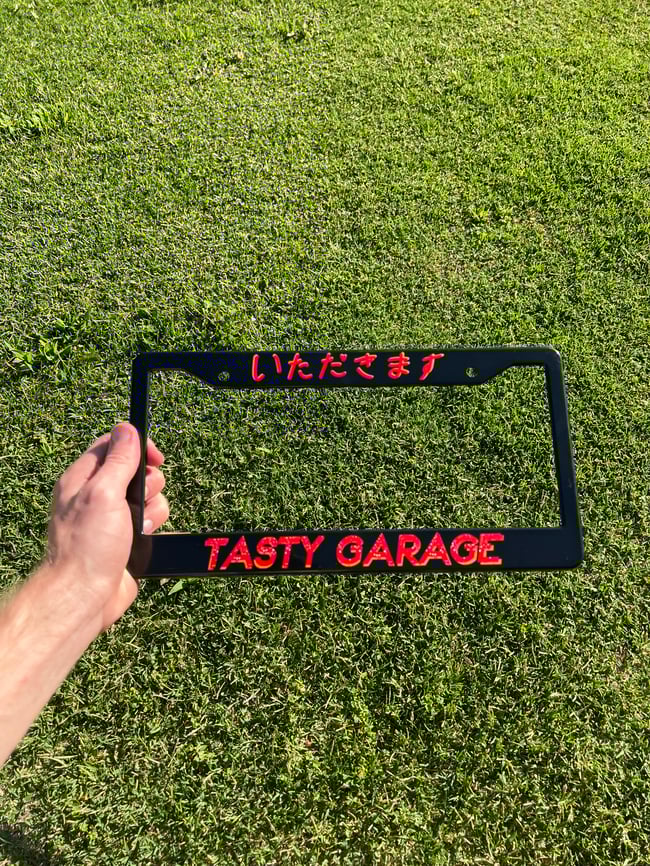 Red Tasty Garage License Plate Frame