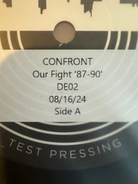 CONFRONT TEST PRESS 