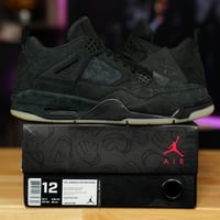 Image 1 of KAWS X Air Jordan 4