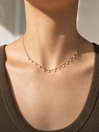 Image 4 of The Lumina Drop Shaker Necklace