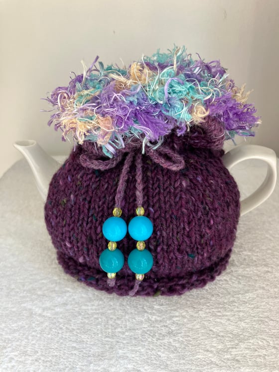 Image of small PURPLE Go On! tea cosie