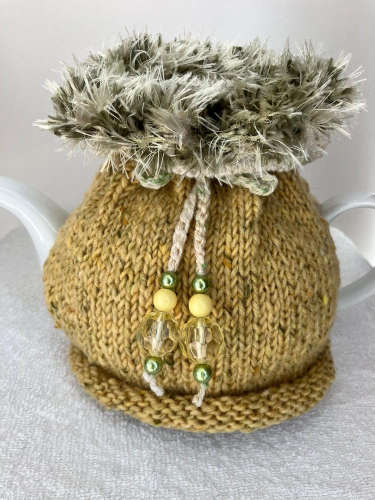 Image of medium PALE YELLOW Go On! tea cosie