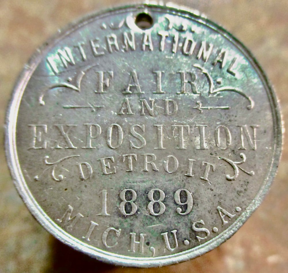 SO-CALLED DOLLAR MEDAL FROM THE 1889 "FAIR & EXPO" IN DETROIT