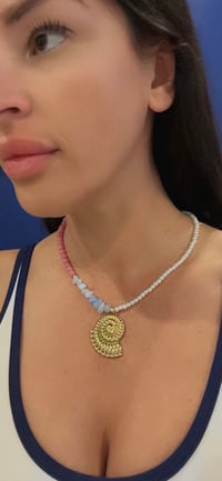 Image 1 of Gold conch shell 