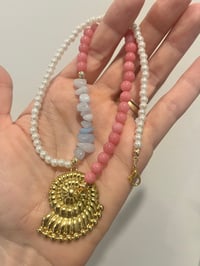 Image 3 of Gold conch shell 