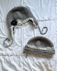 Image 1 of grey lacy hats