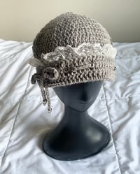 Image 3 of grey lacy hats