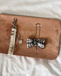 Image 1 of misc ribbon keychains