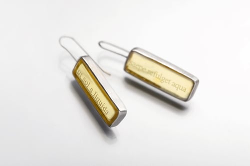 Image of "As sunlight often flashes from running water" silver earrings with amber  · UT SOL A LIQUIDA... ·