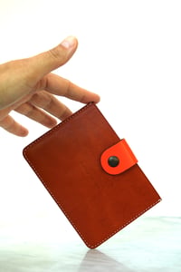 Image 1 of Card-holder in orange and off-white