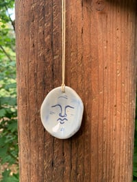 Carved Face Pendant and Diffuser