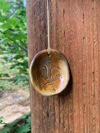 Carved Face Pendant and Diffuser 3