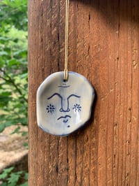 Carved Face Pendant and Diffuser 4