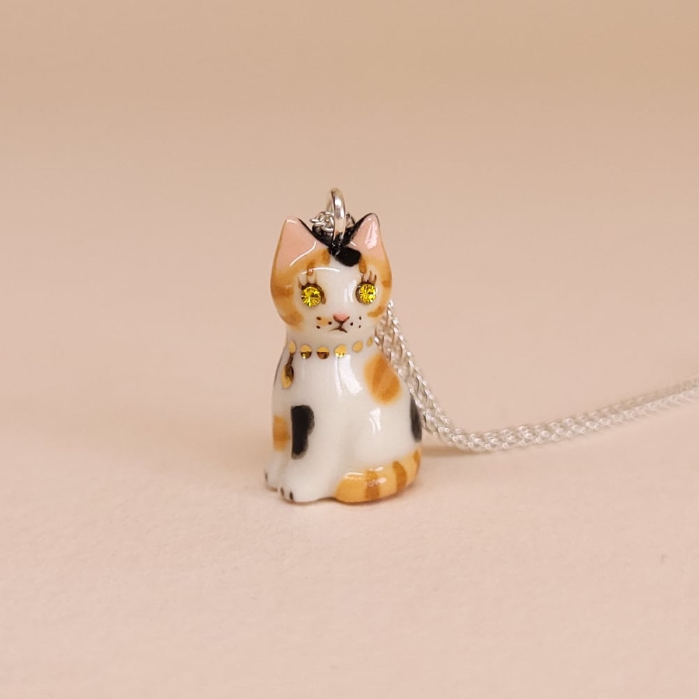 Image of Calico Porcelain & Sterling Silver Sitting Kitten Pendant