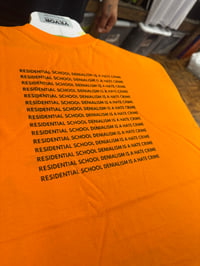 ‘Residential School Denialism is a Hate Crime’ Orange tee